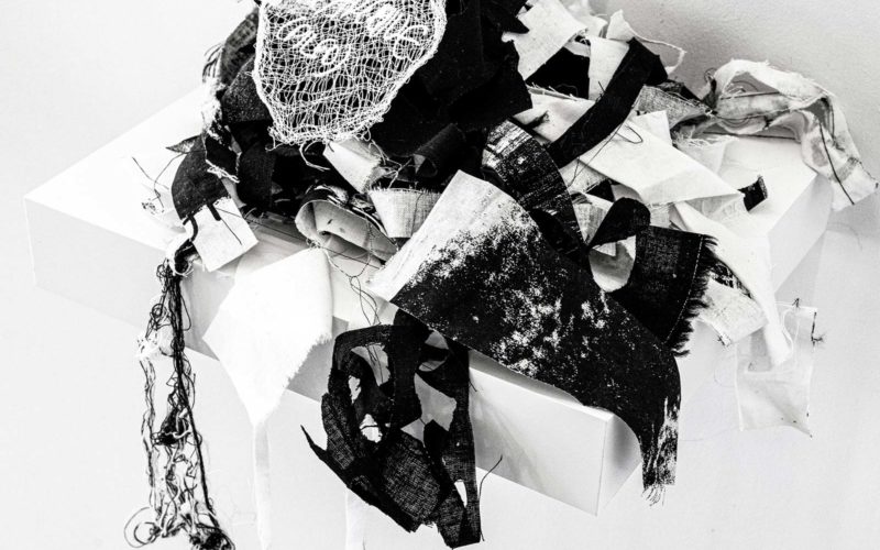 pieces of fabric on a white table