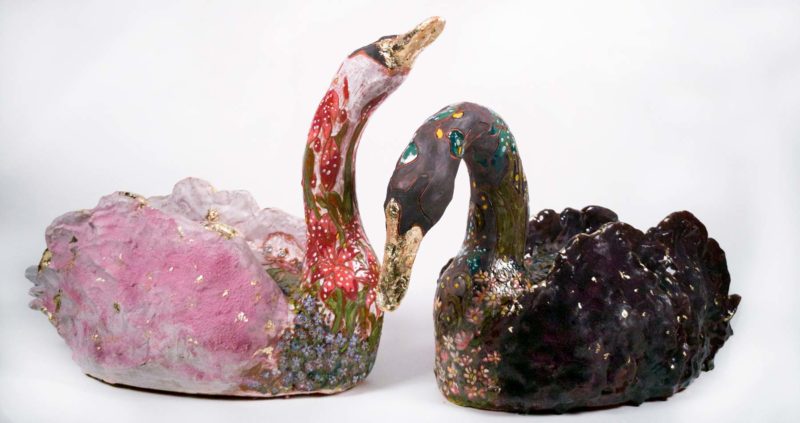 two loon sculptures