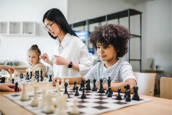 A family playing chess at home