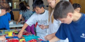 Students working on a craft in a classroom