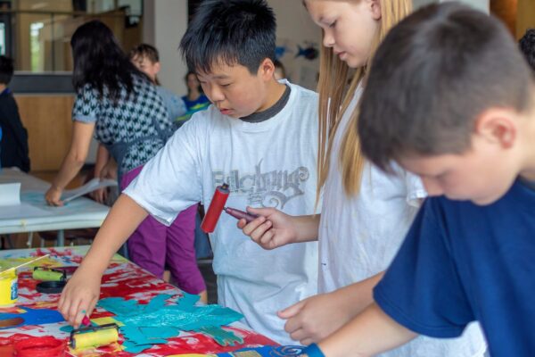 Students working on a craft in a classroom