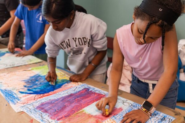 Group of students doing a painting activity
