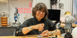 Artist working on design craft in studio