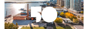 White 50 icon against a Toronto waterfront backdrop.