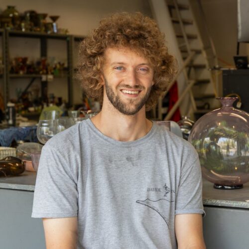 Artist working on craft in studio