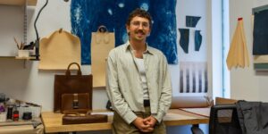 Artist working on design craft in studio