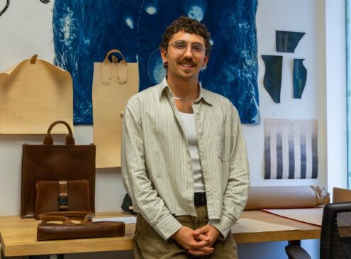 Artist working on design craft in studio