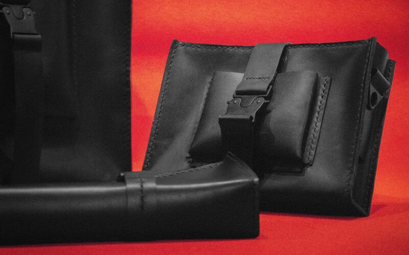 Black bag against red background