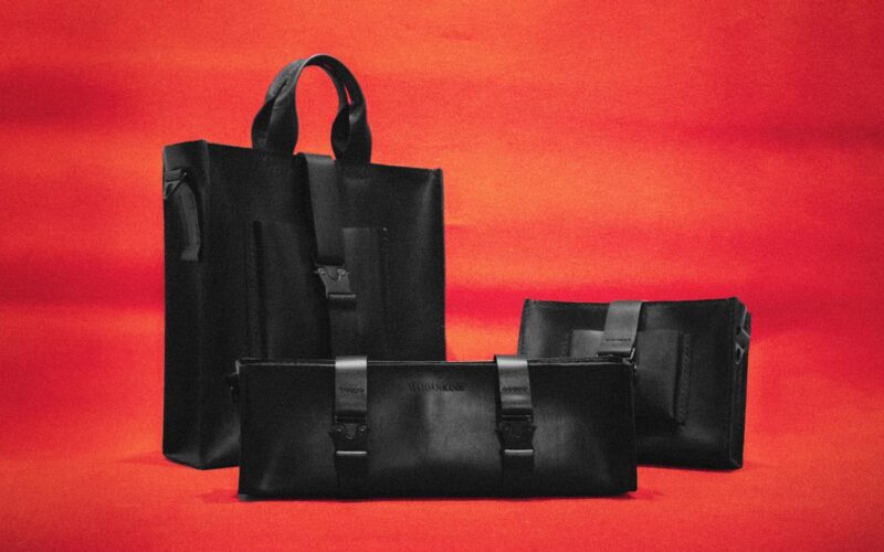 Black bag against red background