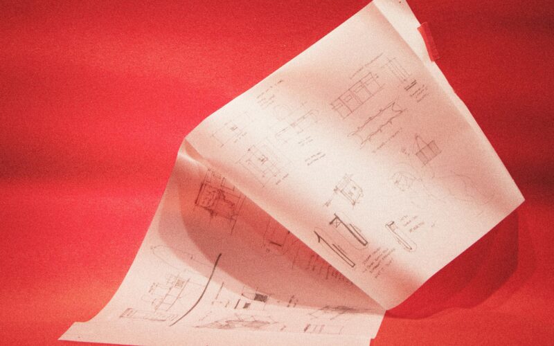 White book against a red background.