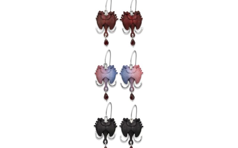 Heart earrings against white background
