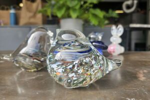 Glass bird ornament on a table