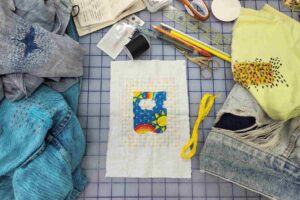 Fabric mending materials laid out on a table