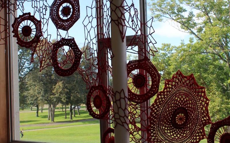 Red textile work in an exhibition