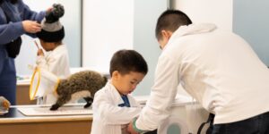 Group of children in a pretend science lab