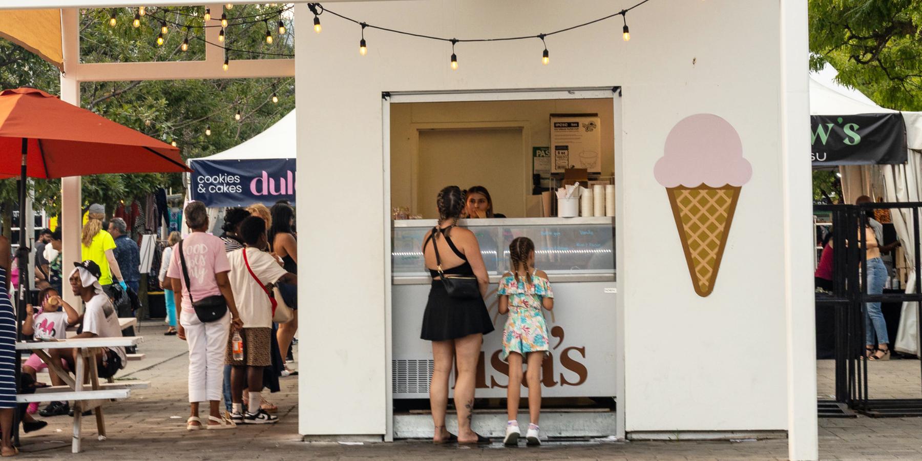 An exterior shot of Lisa's ice cream store