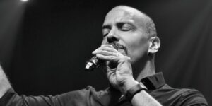 A man singing into a microphone