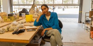 Artist working on craft in studio