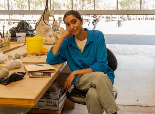 Artist working on craft in studio