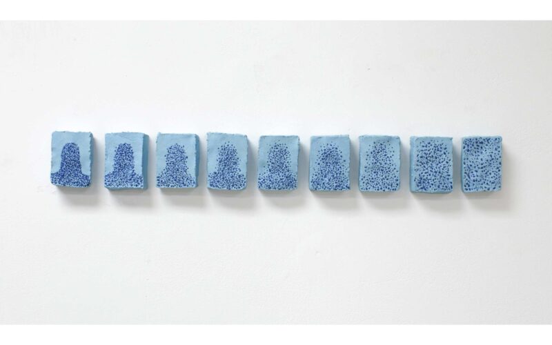 Light blue ceramic artwork