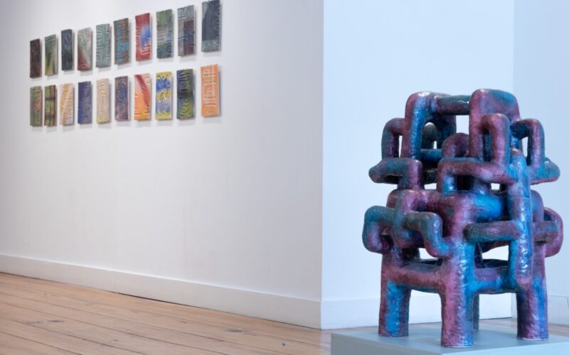 An up-close shot of a ceramic work in a gallery