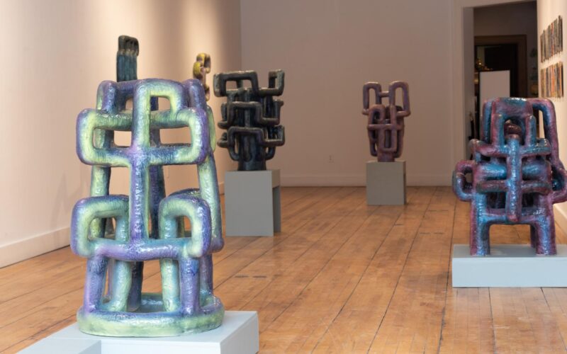 An up-close shot of a ceramic work in a gallery