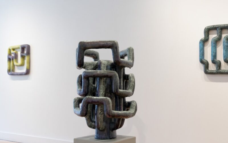 An up-close shot of a ceramic work in a gallery