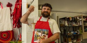 Artist working on design craft in studio