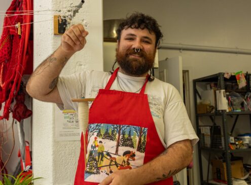 Artist working on design craft in studio