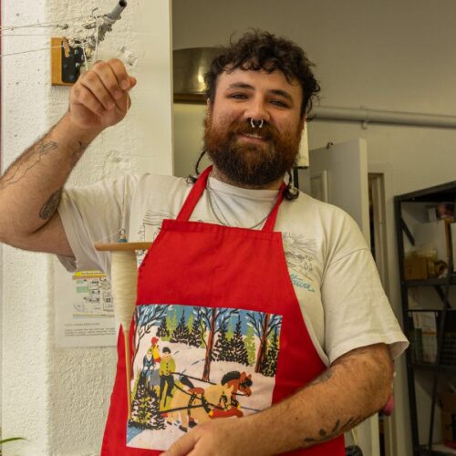 Artist working on design craft in studio