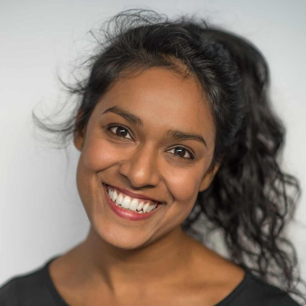 A woman smiling for the camera headshot