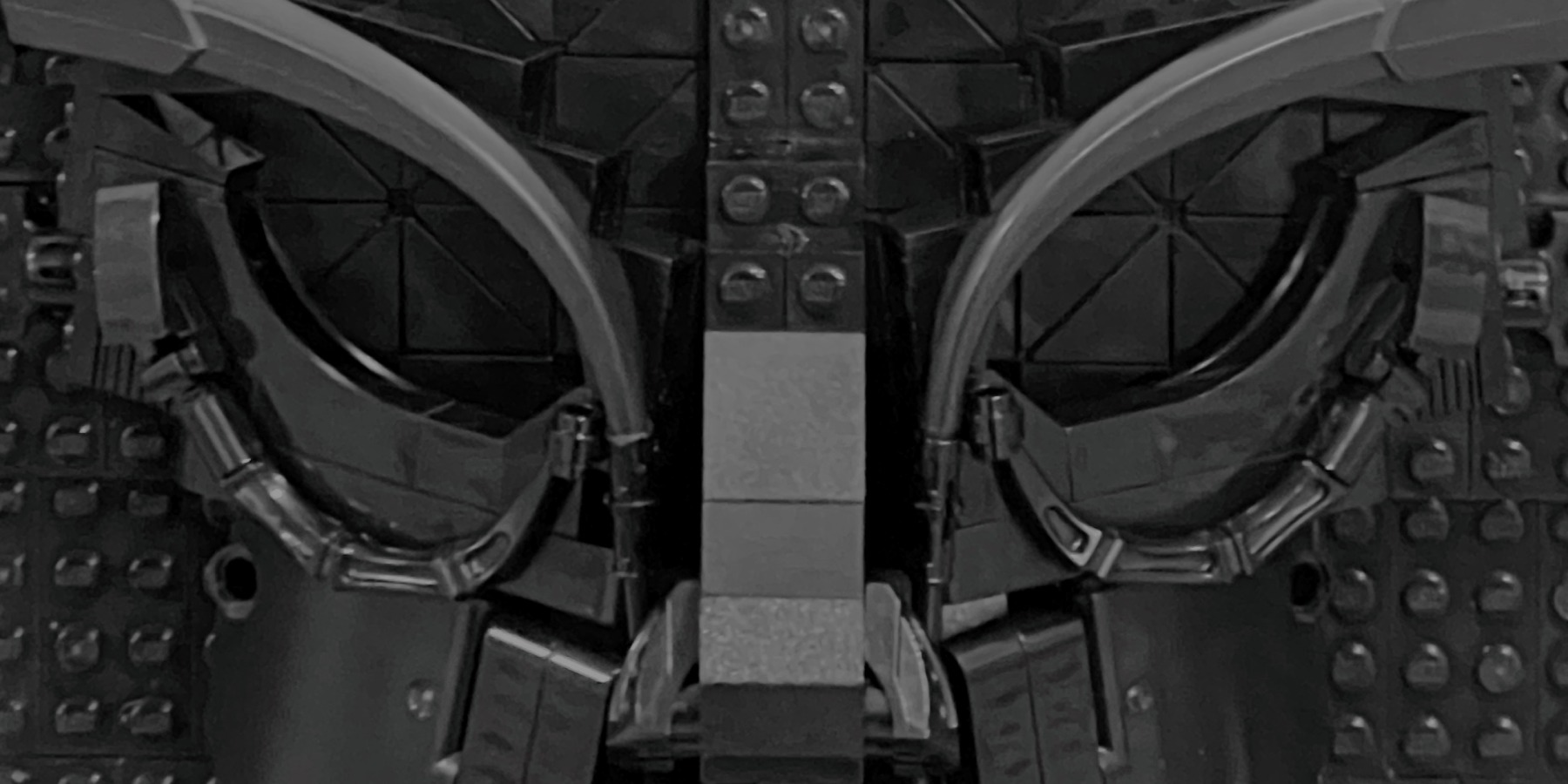 A closeup of a black LEGO sculpture