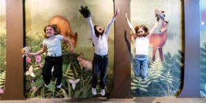 A group of children jumping mid-air