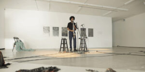 Dwight Jones performing in an open space