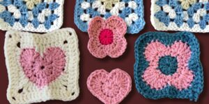 An assortment of colourful crocheted squares