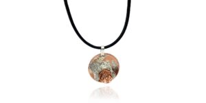 A close-up shot of a pendant necklace