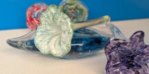 An assortment of floral glass ornaments