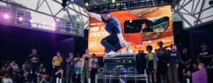 A group of dancers on stage breakdancing