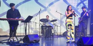 A group of musicians performing on stage