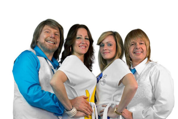 A group shot of ABBA Revisited, the band