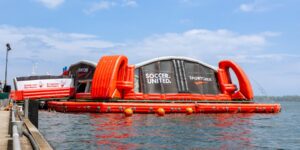 Inflatable floating soccer pitch on water