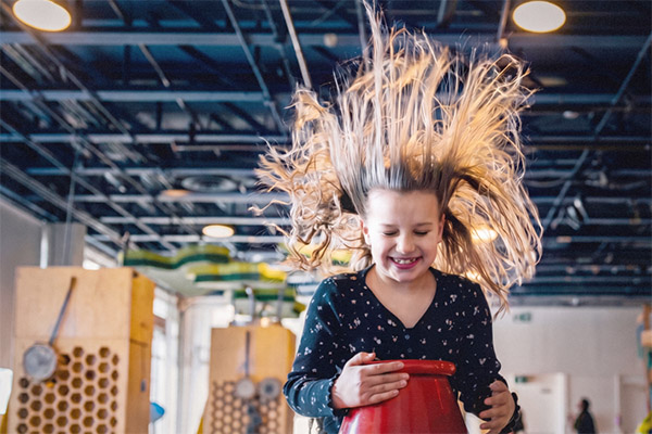 Group of children in a pretend science lab