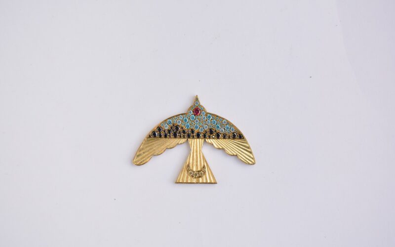 Gold bird metal work close-up