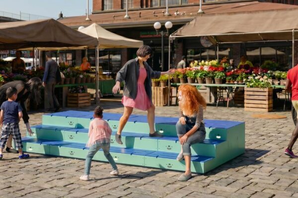 Group of people interacting with an art installation