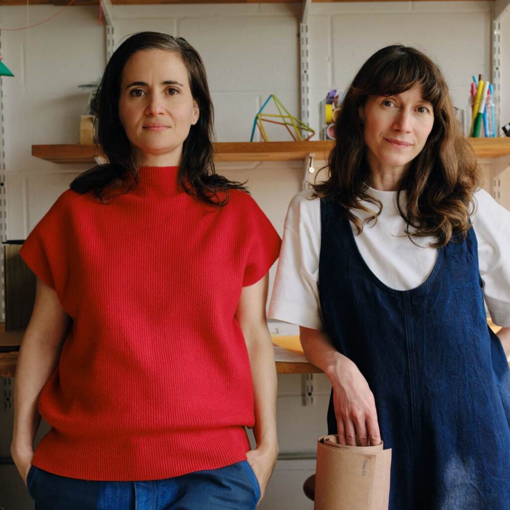 Photo of two women posing for the camera