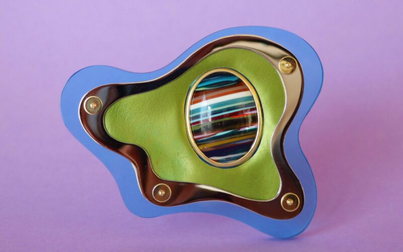 Green brooch close-up