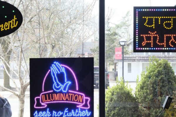 A window of neon signs